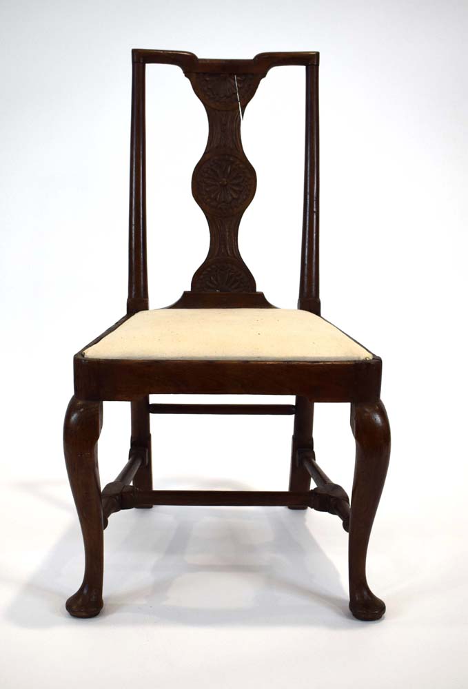 An 18th century Welsh oak side chair with a wheel back, c.