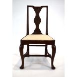 An 18th century Welsh oak side chair with a wheel back, c.