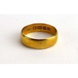 A 22ct yellow gold wedding band, maker WM, Birmingham 1925, ring size M, 3.