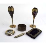 A mixed parcel of silver comprising a pair of spill vases, a cuff-type bracelet, an ARP badge,