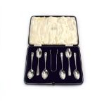 A cased set of silver brightcut teaspoons and a pair of matching sugar nips, maker GJ DF,