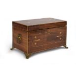 A mid-19th century mahogany and marquetry tea caddy with brass lion mask handles and claw feet,