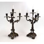 A pair of early 20th century bronze foliate four-branch candelabrum, h.