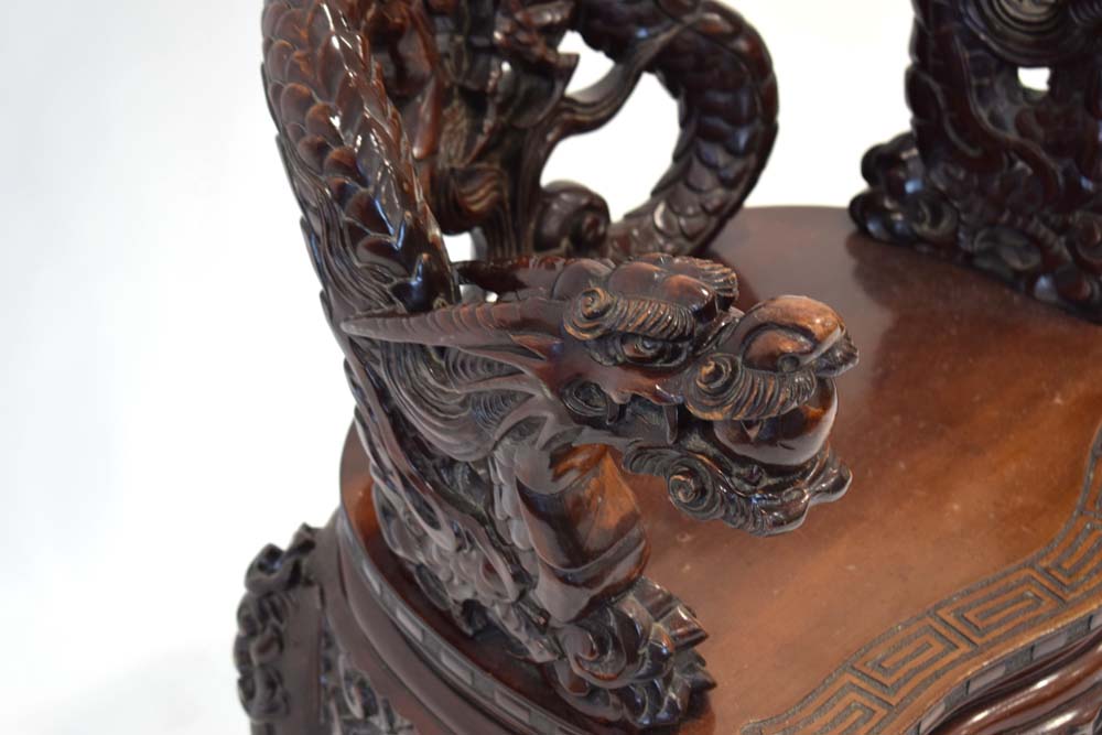 A mid-20th century Oriental hardwood and lacquered chair with intricate dragon carving, - Image 2 of 3