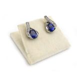 A pair of 14ct white gold ear studs of teardrop design set oval tanzanite and small diamonds, l. 1.