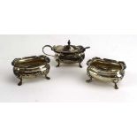 An Edwardian three piece silver cruet set, Walker & Hall, Sheffield 1908,