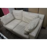Cream leatherette 2 seater sofa