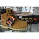 Pair of Timberland boots in tan colour, size 12