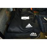 Pair of Adidas tracksuit bottoms and pair of Adidas shorts