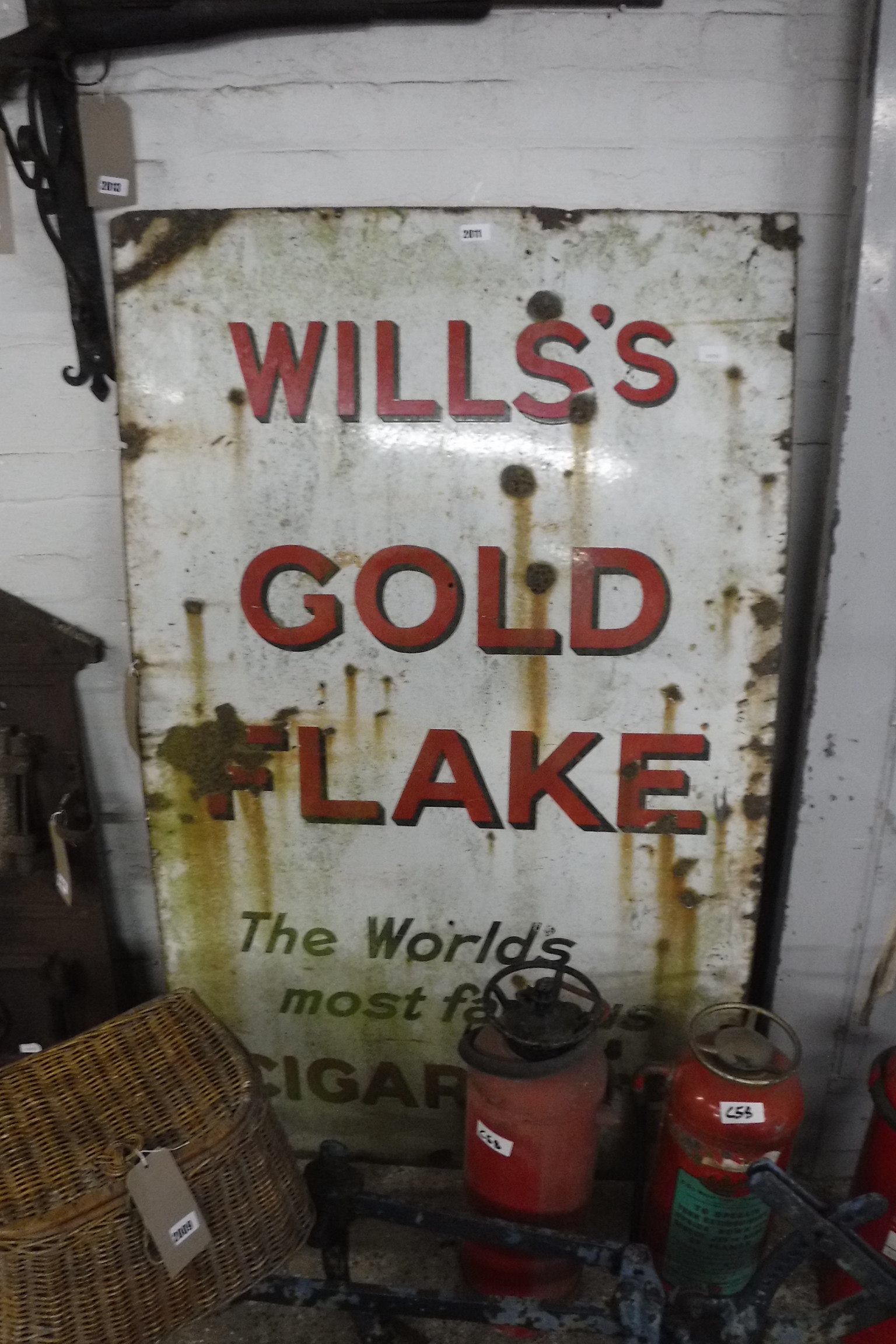 Enamelled metal sign advertising Will's Goldflake cigarettes, 915mm x 1530mm