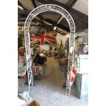 White painted metal garden arch