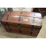 Brown painted metal banded twin handled wooden trunk