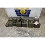 Collection of 9 large weights and shoe maker's last
