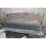 Wrought iron and wooden decorative garden bench