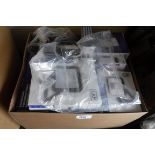 Box containing various LED outdoor security lights