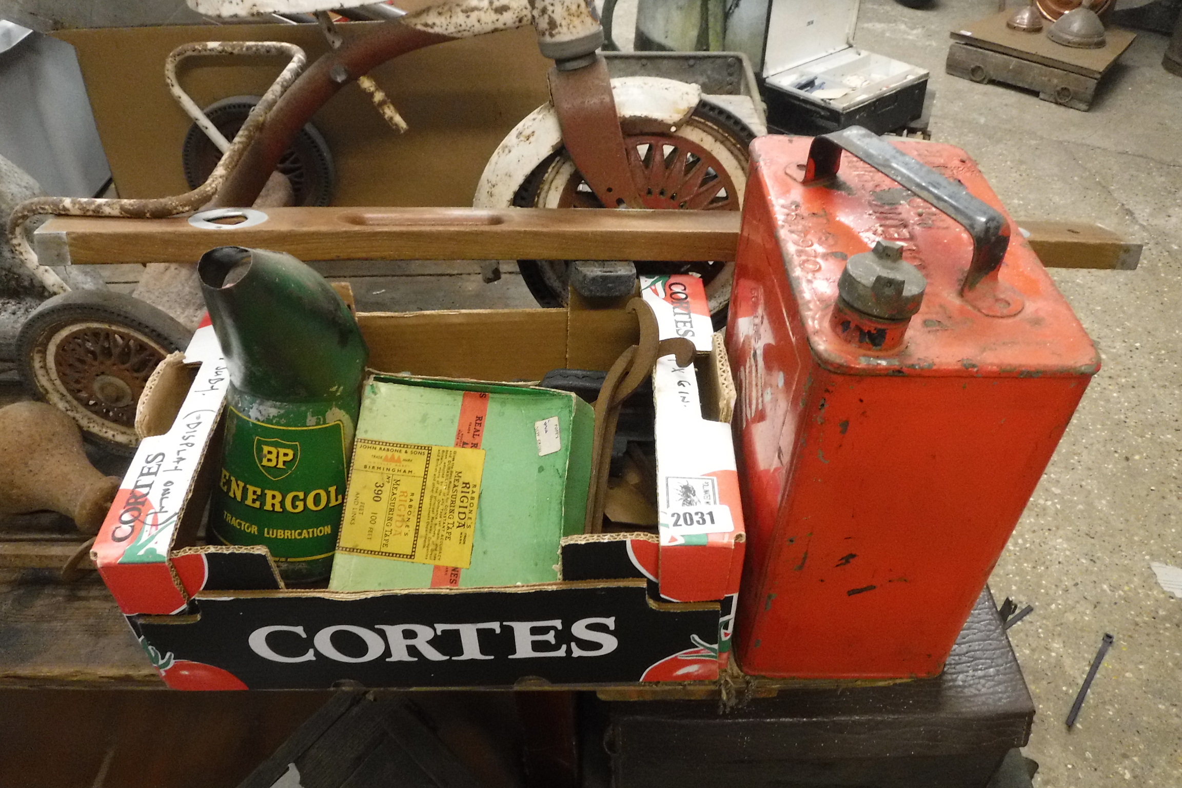 Red petroleum spirit can, BP lubricant pourer, small gin trap, wooden spirit level and a boxed