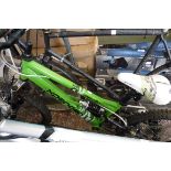 Child's expander mountain bike in green and black