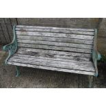 Wrought iron and wooden decorative garden bench