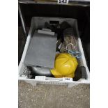 White crate containing mixed hand tools, yellow protective hat, wooden pegs and other house wares