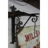 Ornate wrought iron basket bracket