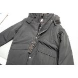 Child's weatherproof outdoor jacket in black, size XL