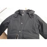 Child's weatherproof outdoor jacket in black, size L