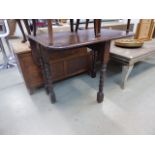 An oak barley twist dropside table