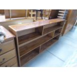 A walnut open fronted bookcase