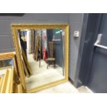A pair rectangular bevelled mirror in a gilt frame