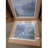 Pair of framed and glazed prints depicting lakes and woodland