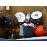 Box containing a collection of alarm clocks