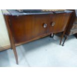 A reproduction mahogany serpentine fronted sideboard