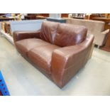 Brown leather two seater sofa