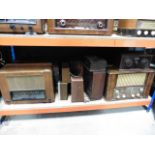 Shelf with a large quantity of vintage radios