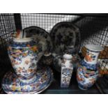 Cage containing a quantity of floral patterned china, to include lidded pots, trays, dinner plates