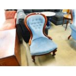 Victorian upholstered button back nursing chair with carved frame