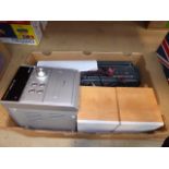 Box containing Panasonic hi-fi system, plus a cassette player