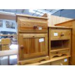 Two pine bedside cabinets