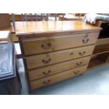 A pine chest of four drawers