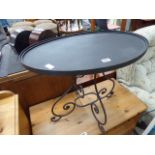 Oval black painted metal occasional table