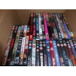 Two boxes containing a quantity of DVD's