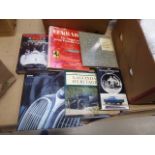 Box containing car reference books