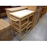 A beech tile topped kitchen island