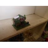 West German tin plate toy chalet with water wheel