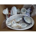 (E) Two boxes containing ornamental figures, ornamental shoes, general crockery, china and dinner