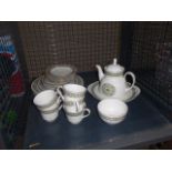 (8) Cage containing a qty of Royal Doulton Celtic jewel pattern china