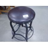 Cast iron adjustable stool