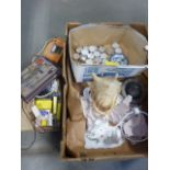 Box containing seashells, ink cartridges, geometry set, battery charger, china and candles