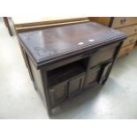 A dark oak storage cabinet