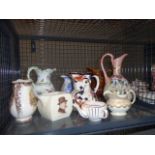 Cage containing an invalids mug plus a qty of ceramic water jugs